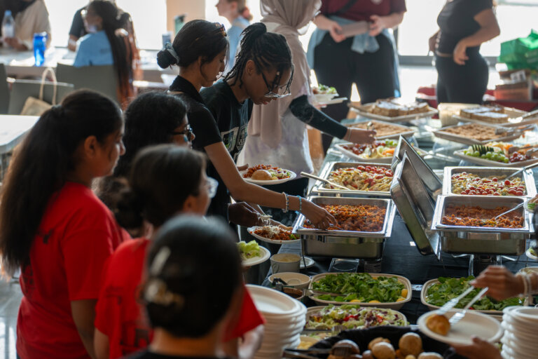 Students getting food catered by McMaster Housing and Conference Services.